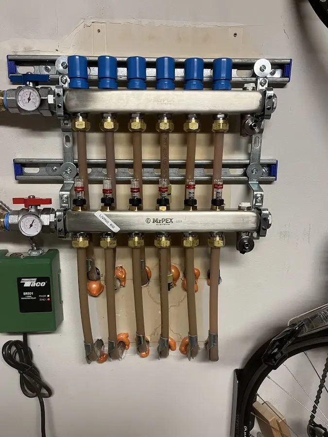 Plumber performing Gas Line Installation at a residential property in Lake Hallie